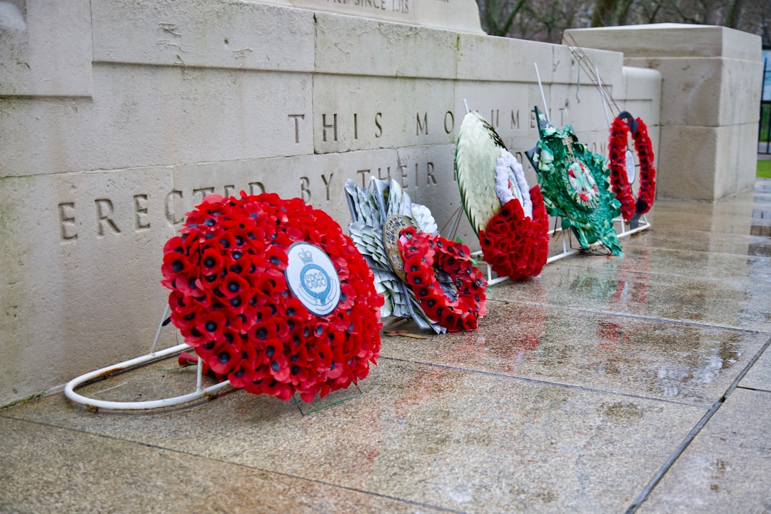 Respectful poppy wreath placed at a war memorial for remembrance