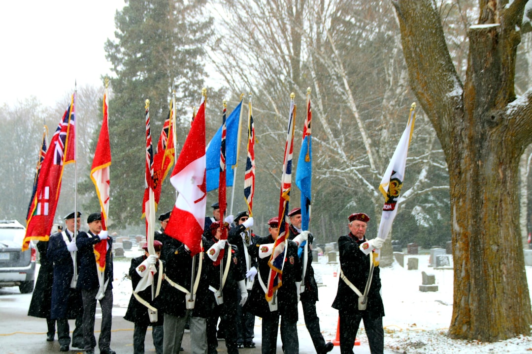 Royal Navy veterans sharing stories and camaraderie in a community setting
